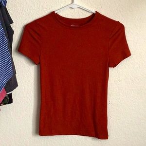 This is another tight shirt it’s the exact same as the black one just orange.